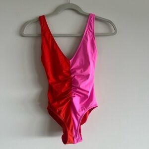 Solid and Striped One Piece Swimsuit. Size XS. Pristine Condition.